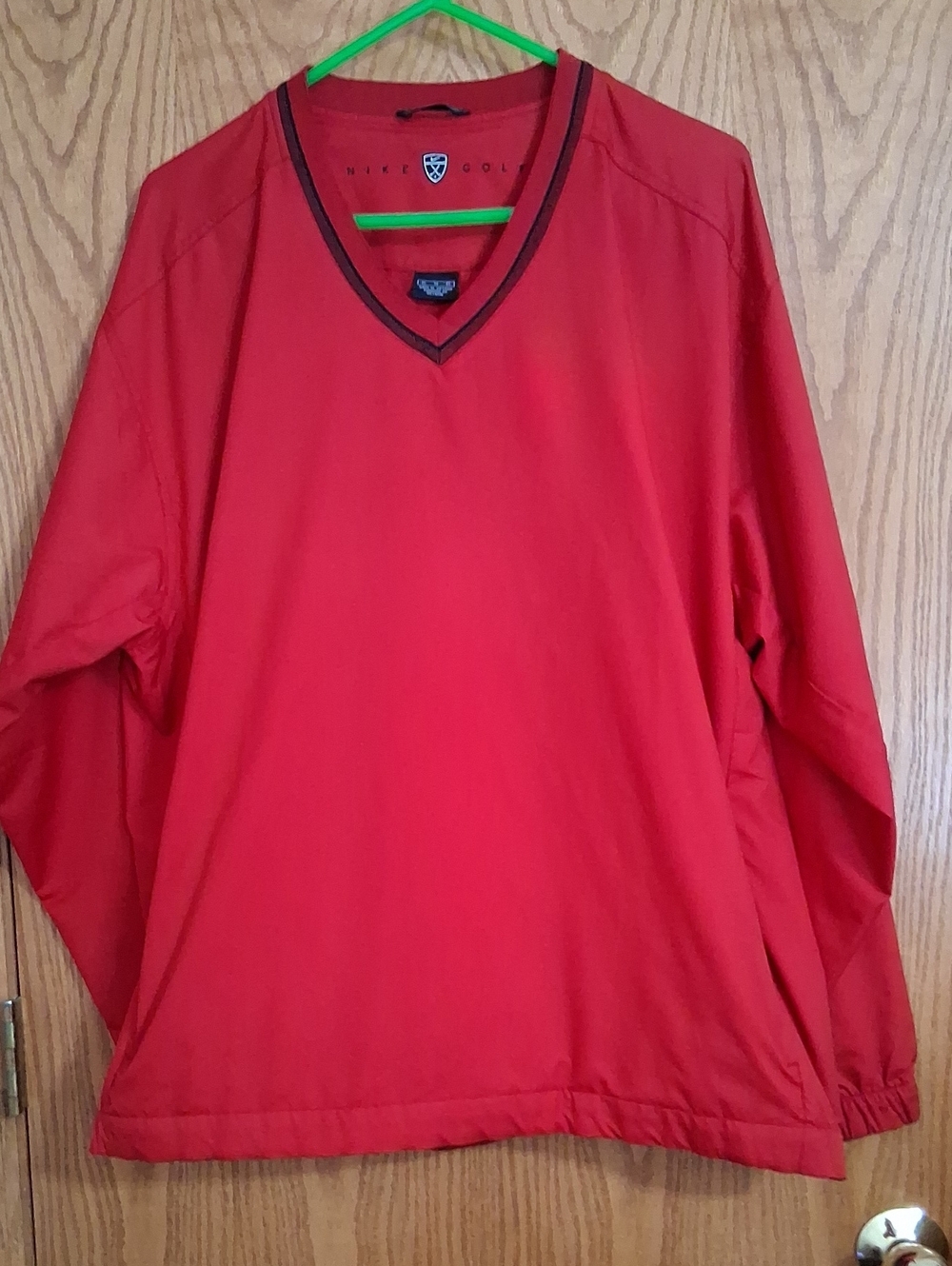 Red men's Nike Golf pullover windbreaker, size XL